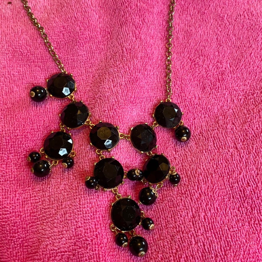 Women’s black and gold statement necklace